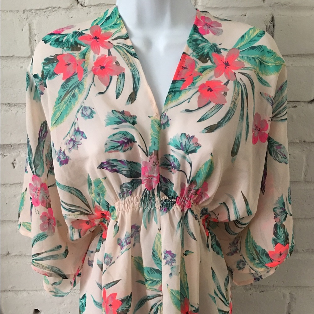 Sheer floral tunic.